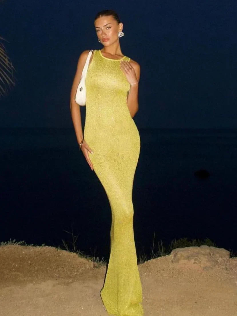 NOMI™ - Lange jurk met glinsterende pailletten en een aansluitende pasvorm