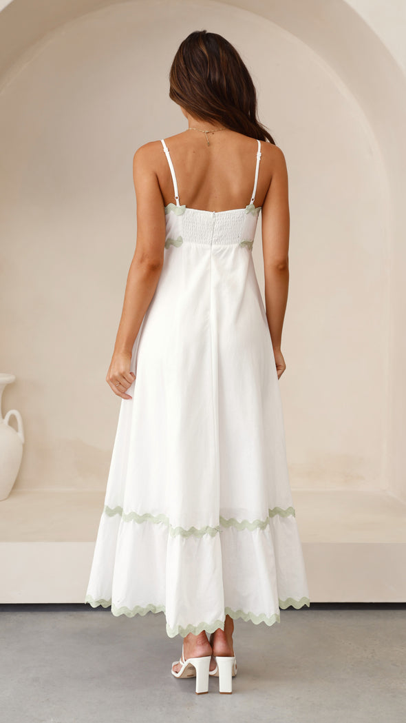 CLARA | LANG JURK DIE DE ZOMERSE VROUWELIJKHEID BEKLEMTOONT